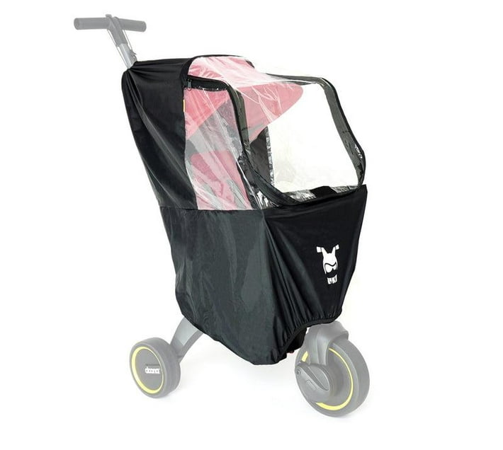 Someone’s in a Makro Doona Liki Trike Rain Cover Mood