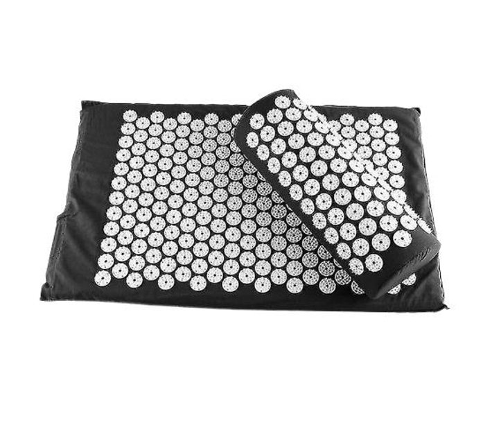 Someone’s in a Makro Acupressure Yoga Mat and Pillow Set for Pain