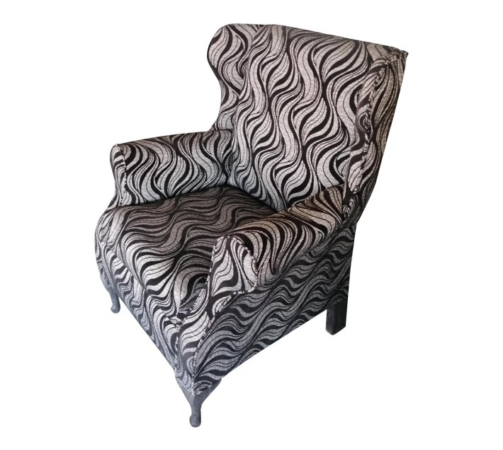 Someone’s in a Makro Wingback Chair Black & Silver Wave Mood